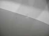 an image of a close up of a toilet seat