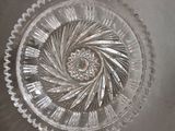 a glass plate with a spiral design on it