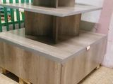 three shelves that are stacked on top of each other
