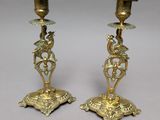 pair of antique brass candlesticks with birds and flowers