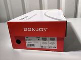 the box is open on the table next to the phone