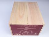 a wooden box that has a wine label on it