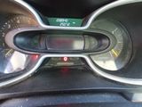 a close up of a car dashboard with a speedometer