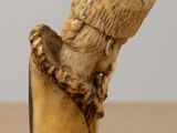 a small pipe that is sitting on a table