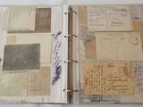 an open book with a lot of old papers on it