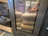 an image of a display of recliners in a store
