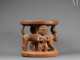 an image of a wooden table with a man and a dog on it