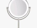 a close up of a mirror on a stand on a white background