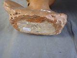 a wooden shoe that is sitting on a table