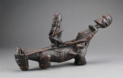 an old bronze figurine of a man on a horse