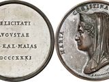 quatre plaques ovales représentant des têtes de femmes et portant des noms