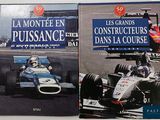 two books on a white table with a picture of a racing car
