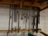 many tools hanging on the wall in the garage