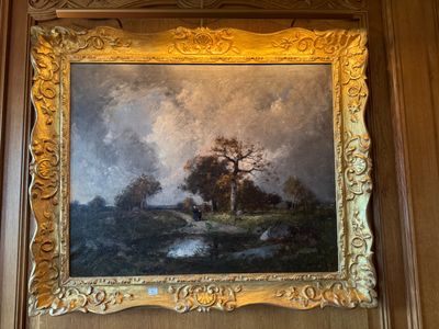 une photo d'un tableau accroché au mur