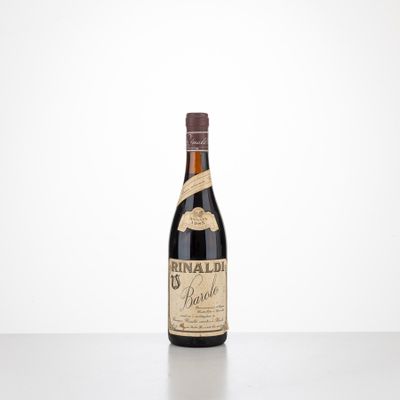 a bottle of wine sitting on top of a table