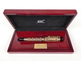 an image of a pen in a wooden box on a white surface
