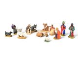 de nombreuses figurines représentant des personnes et des animaux sur un fond blanc