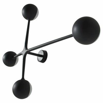 an image of a black and white clock with three balls
