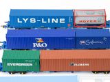 four train cars that are lined up next to each other