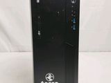 a black desktop computer sitting on top of a white table
