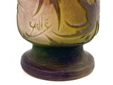 a vase with a design on it on a white background