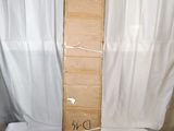 a picture of a wooden cross on a white sheet