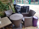 a table and chairs that are outside in the yard