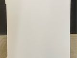 an image of a white freezer sitting on top of a counter
