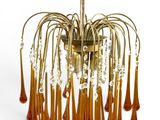 an image of a chandelier made of glass and brass