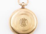 an image of a gold pocket watch on a white background