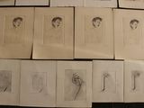 a lot of drawings that are on the table