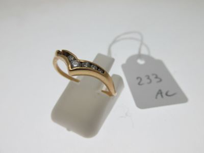 an image of a gold ring with diamonds on it next to a price tag