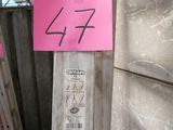 a pink sticker on the side of a building