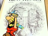 un livre sur lequel figure un personnage de bande dessinée, posé sur une table