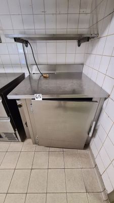a kitchen with a sink, stove, and dishwasher in it