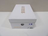 a white box that has a gold logo on it