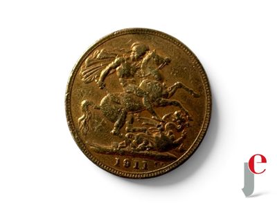 une pièce d'or sur laquelle figure l'effigie d'un homme à cheval