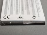 a close up of a piece of paper with a sticker on it