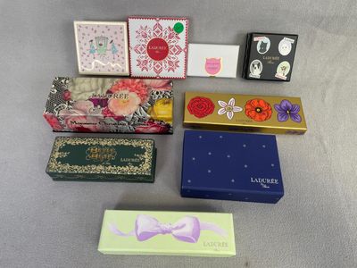 many different types of boxes that are on the table