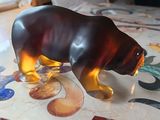 a statue of a bear that is on a table