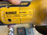 someone is holding a cordless drill in their hand