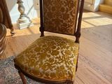 a chair that is sitting in the middle of a room