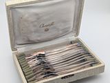 a box with a set of silverware in it