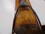 a close up of a snowboard with a handle on it