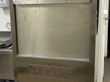 a stainless steel dishwasher in a kitchen with a sink