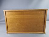 a small wooden box with a lid on a white background