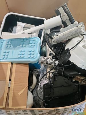 a box full of electronics and other items in it