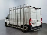 a white van that is parked in a room