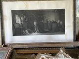 a picture of a group of framed pictures on a table