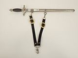 a close up of a metal pole with a black strap on it